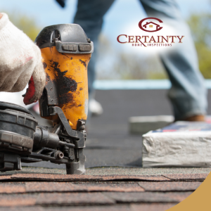 Roof inspection with a roofing nail gun being used to secure shingles.