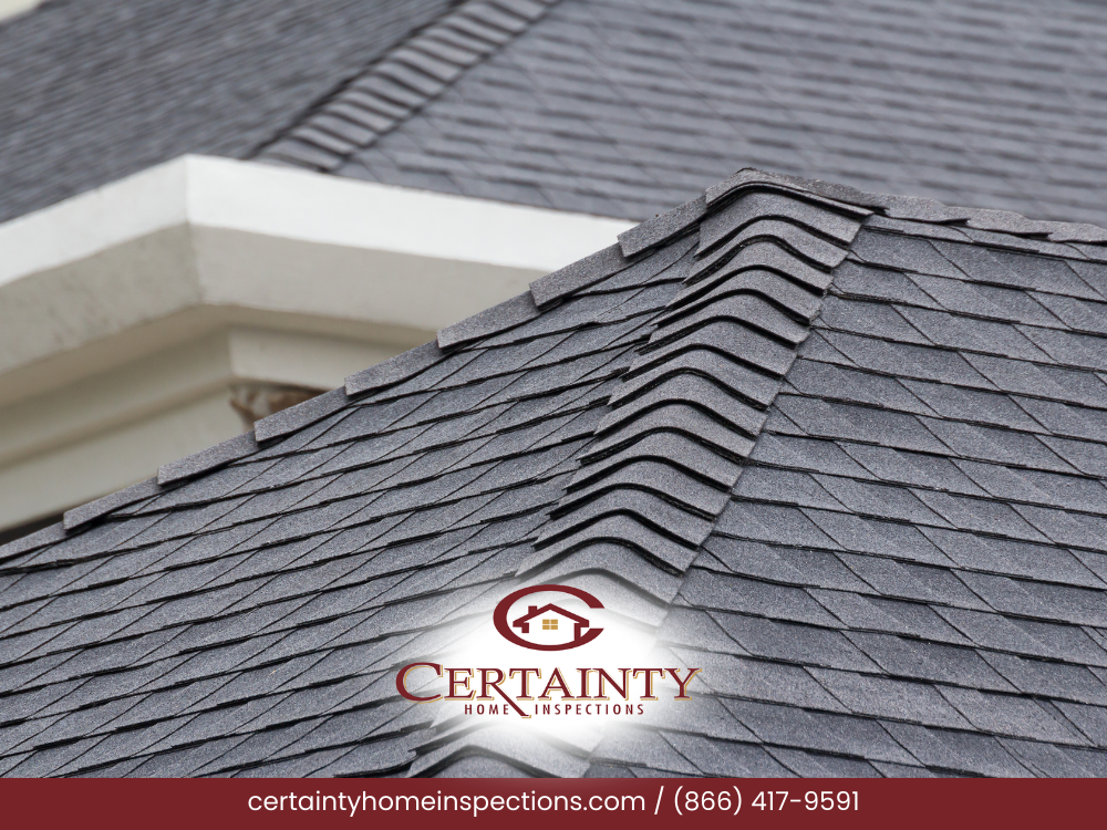 Damaged roof shingles due to storm impact, requiring urgent attention.